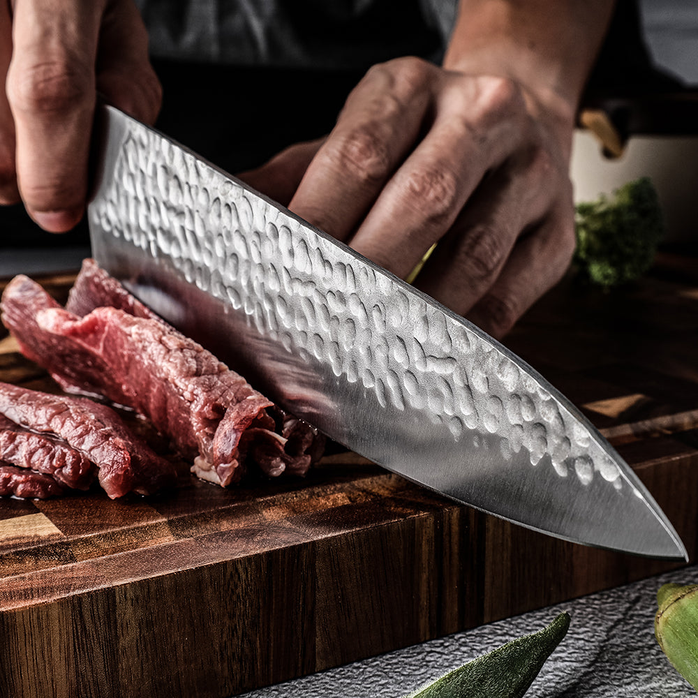 Nizo Japan Chef edition peilis pjaustant mėsą – profesionalus valdymas ir reljefiniai nerūdijančio plieno ašmenys